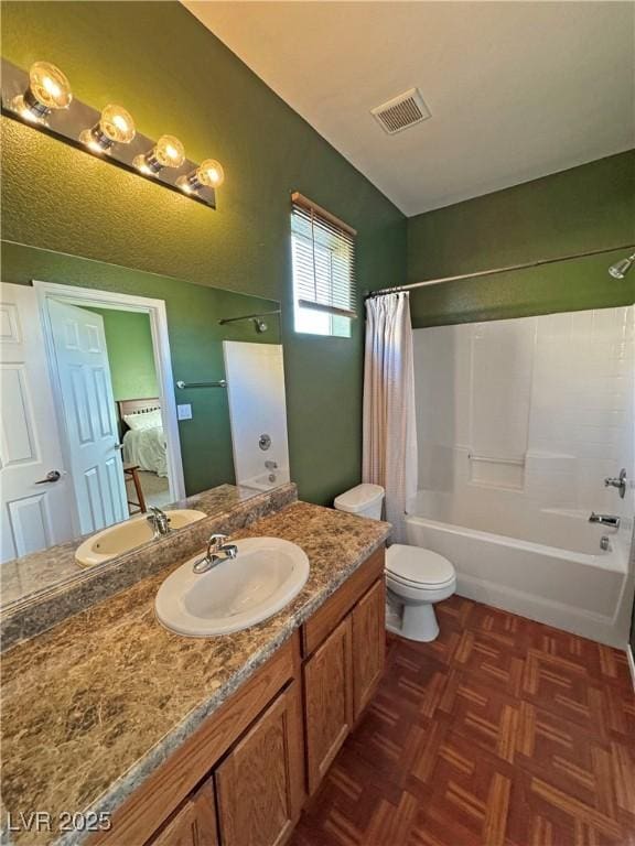 full bathroom with toilet, vanity, parquet floors, and shower / tub combo with curtain