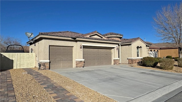 view of front of home with a garage