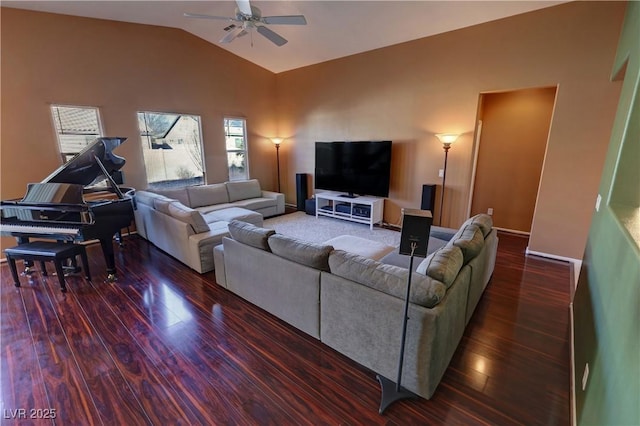 living room featuring ceiling fan, lofted ceiling, and dark hardwood / wood-style floors