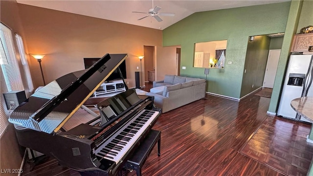 miscellaneous room with lofted ceiling, ceiling fan, and dark hardwood / wood-style floors