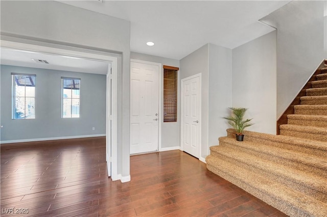 foyer featuring dark wood-type flooring