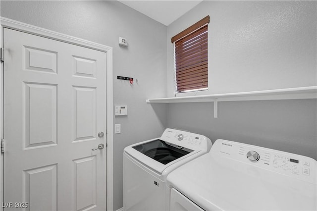 laundry room featuring separate washer and dryer