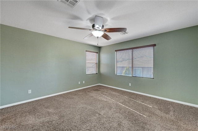 spare room with carpet flooring and ceiling fan