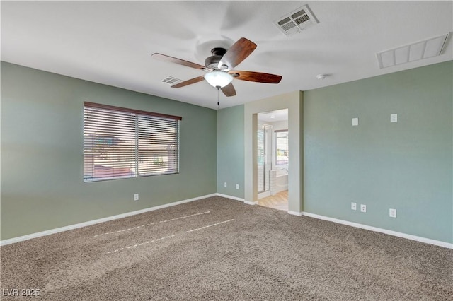 unfurnished room featuring carpet floors and ceiling fan