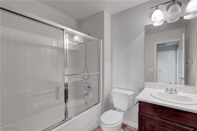 full bathroom with toilet, combined bath / shower with glass door, and vanity