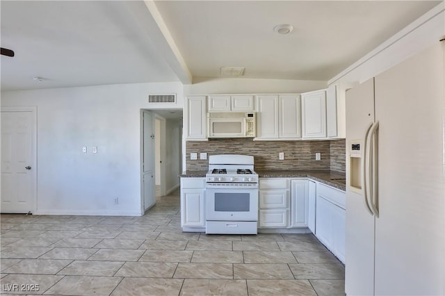 kitchen featuring white appliances, decorative backsplash, white cabinets, and beam ceiling