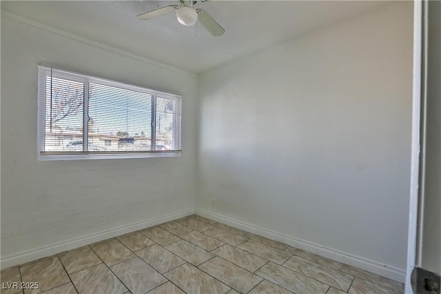 empty room featuring light tile patterned flooring and ceiling fan