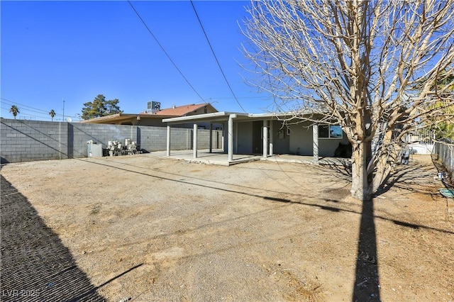 rear view of house with a patio area