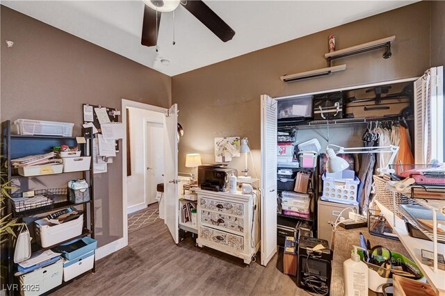 interior space featuring ceiling fan