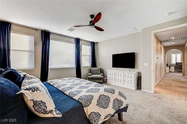 carpeted bedroom featuring ceiling fan