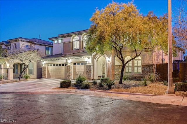 view of front of property with a garage