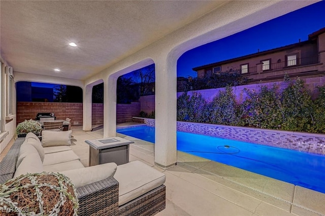 view of pool featuring an outdoor hangout area and a patio