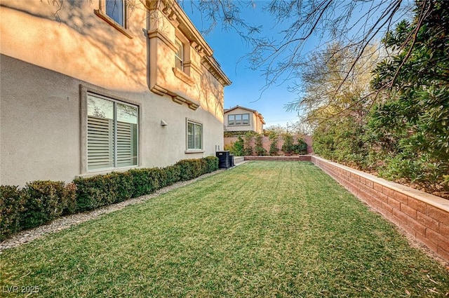 view of yard with central AC