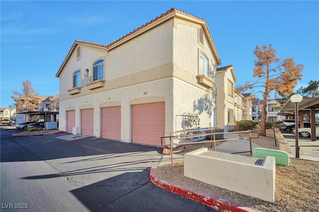 view of home's exterior with a garage