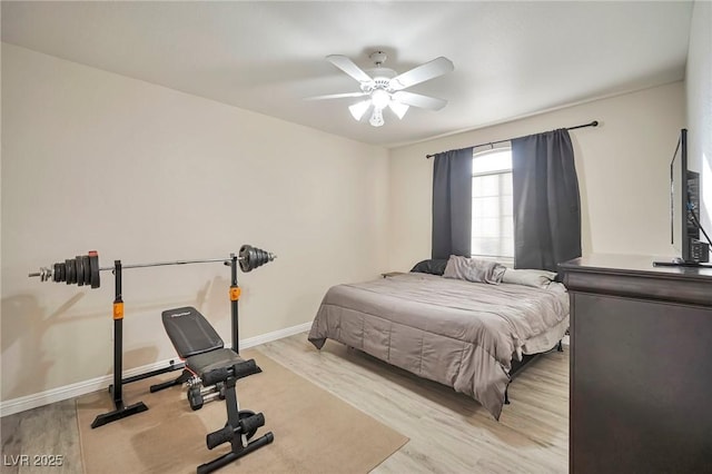 bedroom featuring ceiling fan and light hardwood / wood-style flooring