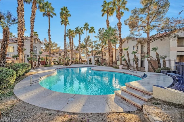 view of swimming pool with a patio