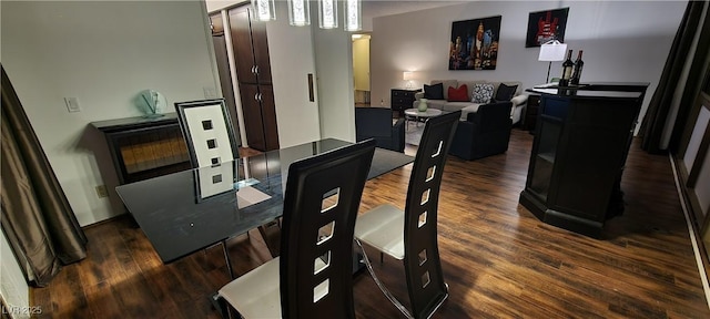 dining room featuring dark hardwood / wood-style floors