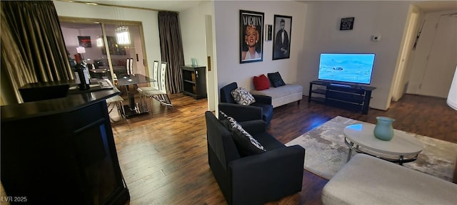 living room featuring dark hardwood / wood-style flooring