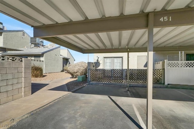 view of patio / terrace with a carport