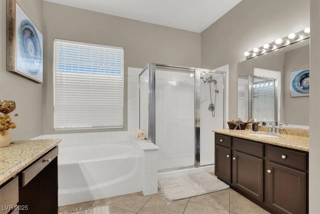 bathroom with separate shower and tub, tile patterned floors, and vanity