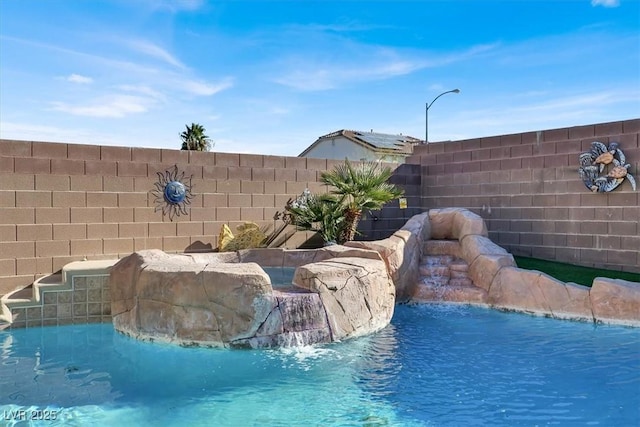 view of swimming pool featuring pool water feature