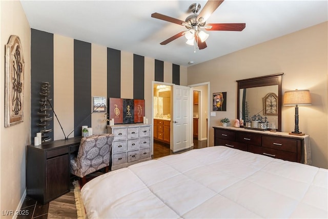 bedroom featuring ensuite bath, ceiling fan, and wood-type flooring