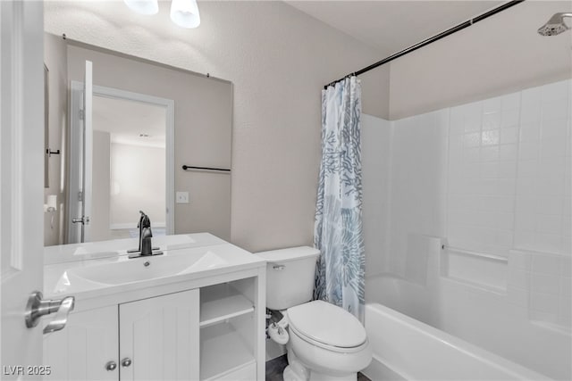 full bathroom featuring toilet, shower / tub combo with curtain, and vanity