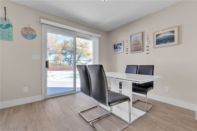 office space with light hardwood / wood-style flooring