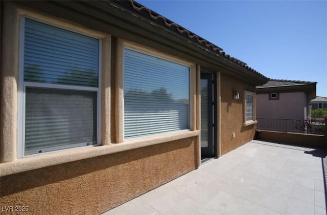 view of home's exterior with a patio