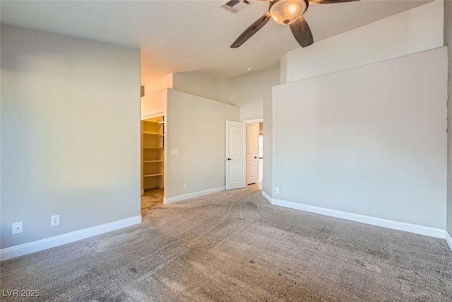 unfurnished room featuring ceiling fan, high vaulted ceiling, and carpet floors