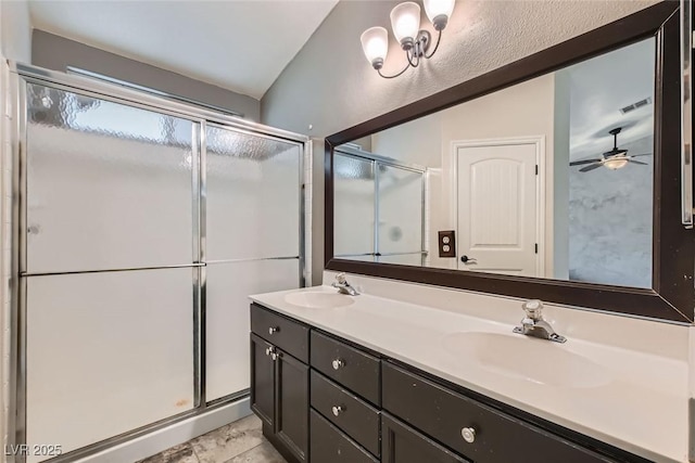 bathroom with an enclosed shower, ceiling fan, and vanity