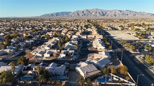 drone / aerial view featuring a mountain view