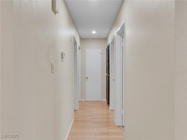 hall featuring light wood-type flooring