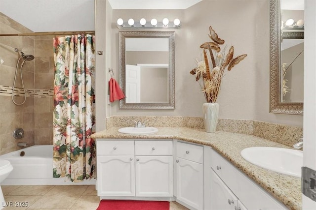 bathroom featuring vanity, tile patterned flooring, and shower / tub combo with curtain