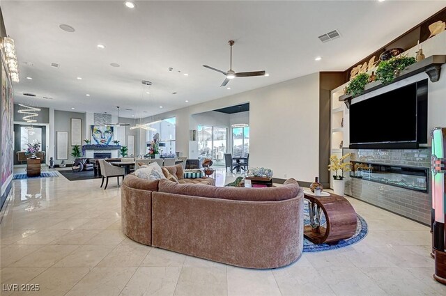 living room with ceiling fan