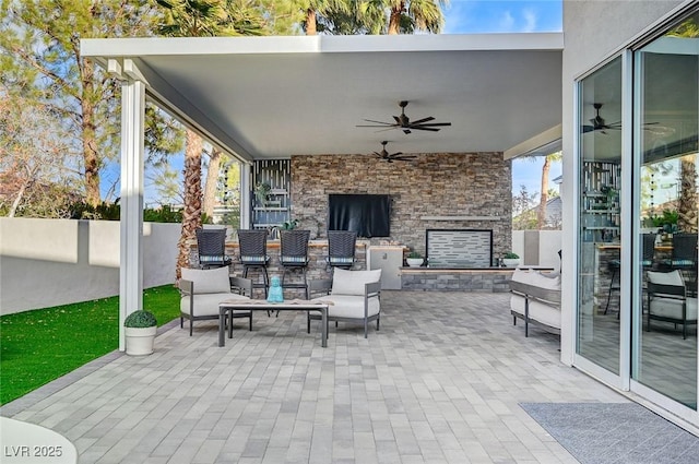 view of patio with ceiling fan