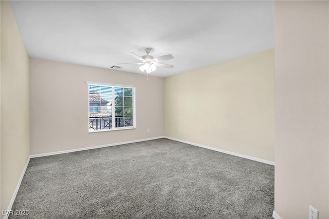 carpeted empty room with ceiling fan