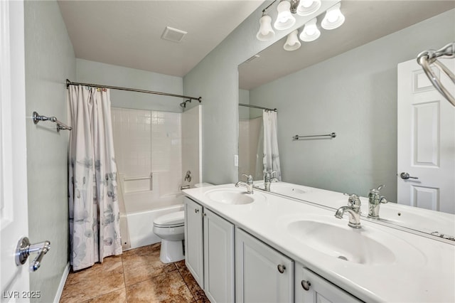 full bathroom featuring toilet, vanity, and shower / bath combination with curtain