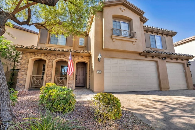 mediterranean / spanish-style house featuring a garage