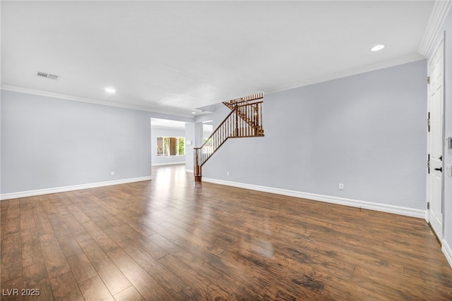 unfurnished living room featuring crown molding and dark hardwood / wood-style floors