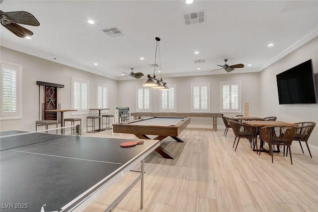 rec room with pool table, ornamental molding, light wood-type flooring, and ceiling fan