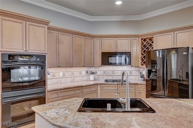 kitchen with sink, light brown cabinets, light stone countertops, black appliances, and crown molding