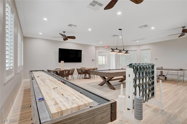 game room featuring billiards, light wood-type flooring, and ceiling fan