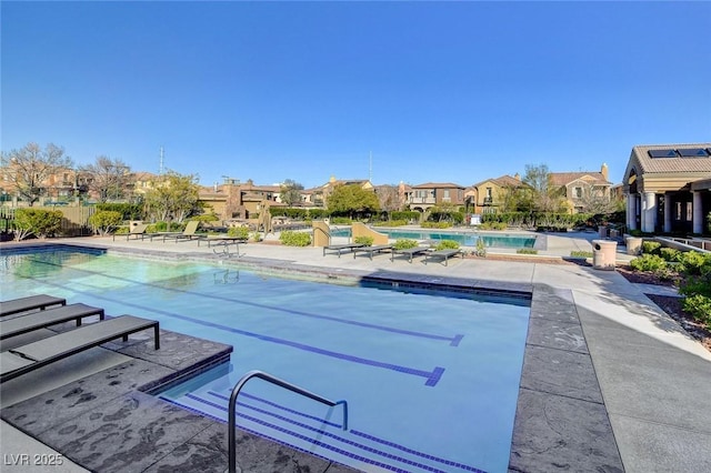 view of pool featuring a patio area