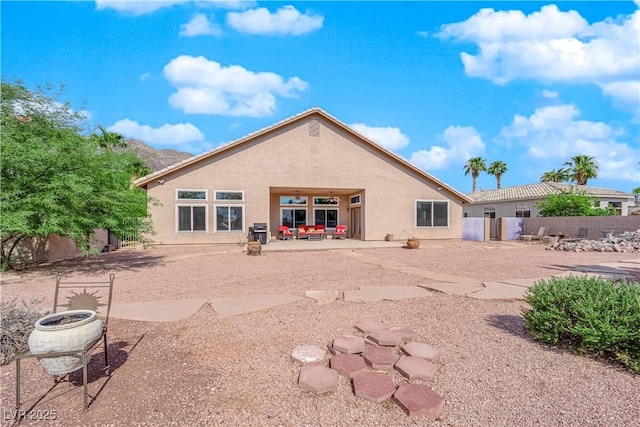 back of property with a patio area