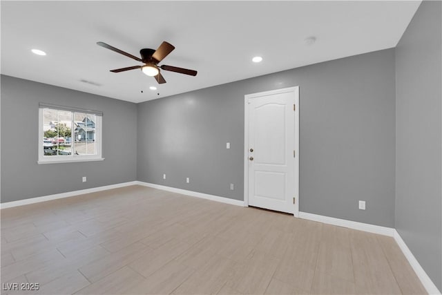 spare room featuring ceiling fan