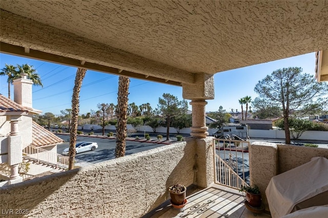 view of patio with a balcony