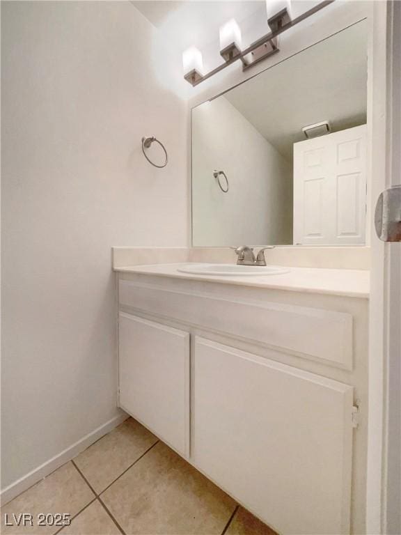 bathroom featuring tile patterned floors and vanity