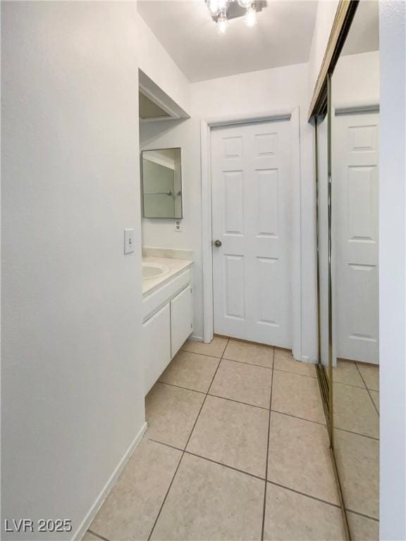 bathroom featuring vanity and tile patterned flooring