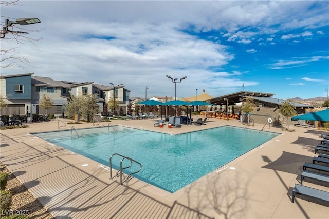 view of pool featuring a patio area